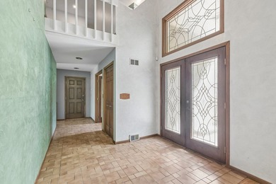 This contemporary 5-bedroom, 2.5-bath home sits on 1.4 wooded - photo 17