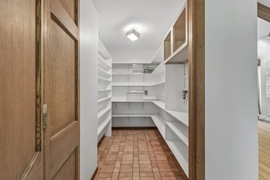 This contemporary 5-bedroom, 2.5-bath home sits on 1.4 wooded - photo 18