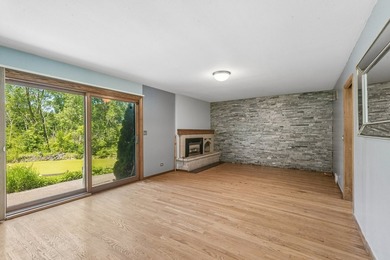 This contemporary 5-bedroom, 2.5-bath home sits on 1.4 wooded - photo 20
