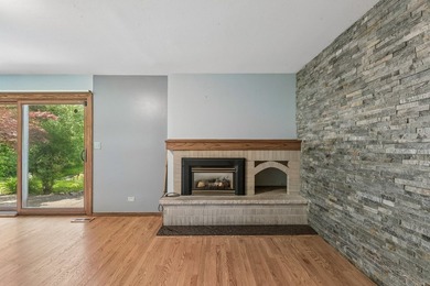 This contemporary 5-bedroom, 2.5-bath home sits on 1.4 wooded - photo 21