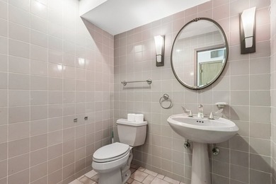 This contemporary 5-bedroom, 2.5-bath home sits on 1.4 wooded - photo 24