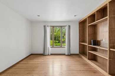 This contemporary 5-bedroom, 2.5-bath home sits on 1.4 wooded - photo 25