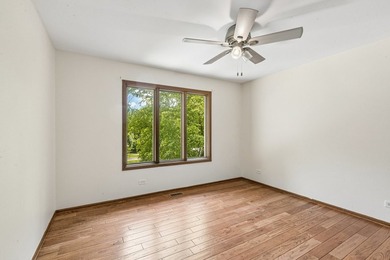 This contemporary 5-bedroom, 2.5-bath home sits on 1.4 wooded - photo 29