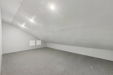 This contemporary 5-bedroom, 2.5-bath home sits on 1.4 wooded - photo 34