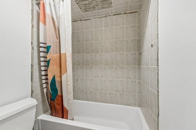 This contemporary 5-bedroom, 2.5-bath home sits on 1.4 wooded - photo 36
