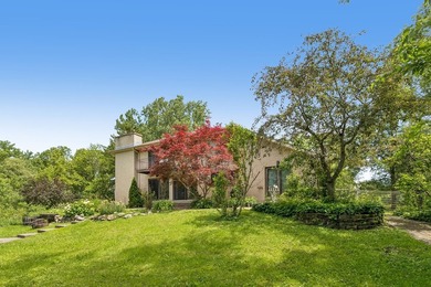 This contemporary 5-bedroom, 2.5-bath home sits on 1.4 wooded - photo 45