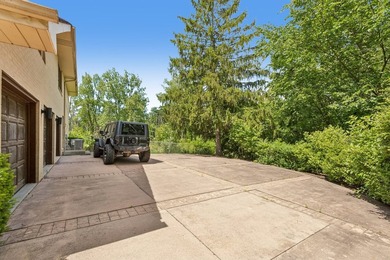 This contemporary 5-bedroom, 2.5-bath home sits on 1.4 wooded - photo 50