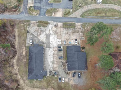 This versatile commercial property offers multiple office spaces