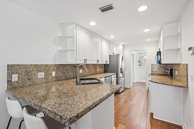 Beautifully maintained 3-bedroom, 2.5-bath townhome. This - photo 2