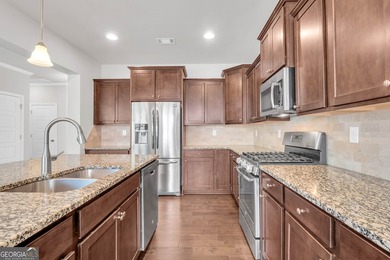 Beautifully maintained and freshly painted two-story home with a - photo 13