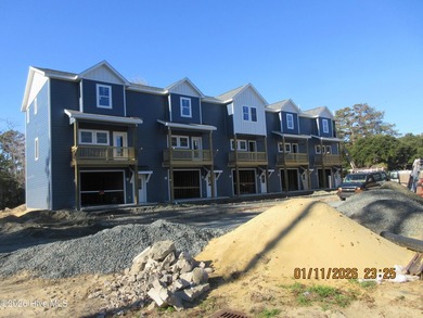New Construction! These quality built Townhomes are located in - photo 1