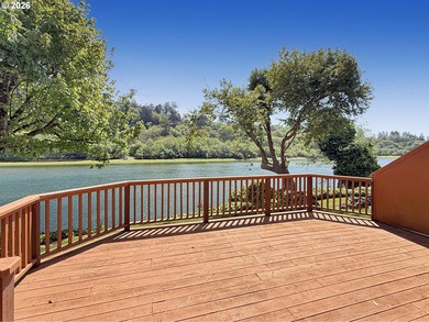 RIVERFRONT living in this beautifully maintained 2-bedroom cabin - photo 2