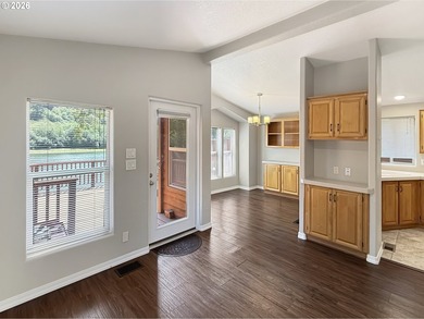 RIVERFRONT living in this beautifully maintained 2-bedroom cabin - photo 3