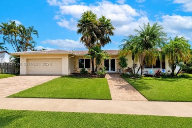 Welcome to this beautifully updated one-story home in the highly - photo 1