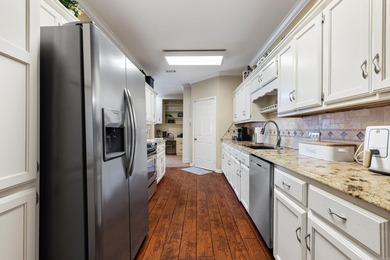 This well-maintained brick home offers a spacious and great - photo 11