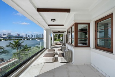 Experience luxury living in this exquisite 3-story waterfront