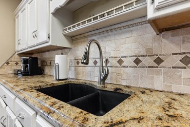 This well-maintained brick home offers a spacious and great - photo 12