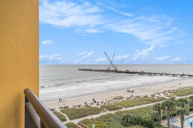 Experience coastal living at its finest in this beautifully