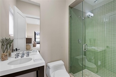 Experience luxury living in this exquisite 3-story waterfront