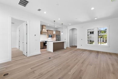 Discover the epitome of upscale living at the Townhomes at the - photo 4