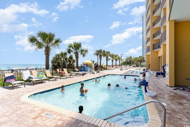 Experience coastal living at its finest in this beautifully