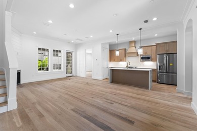 Discover the epitome of upscale living at the Townhomes at the - photo 6