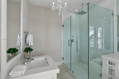 Experience luxury living in this exquisite 3-story waterfront