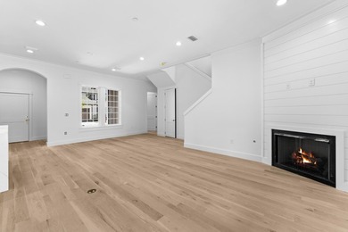 Discover the epitome of upscale living at the Townhomes at the - photo 7