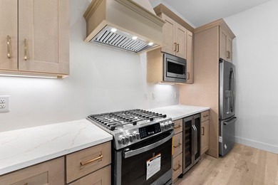 Discover the epitome of upscale living at the Townhomes at the - photo 9