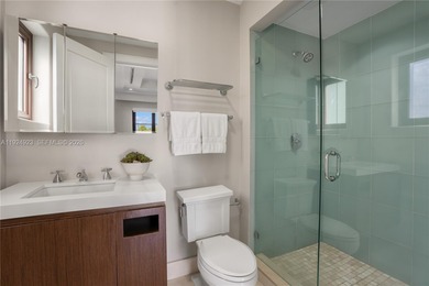 Experience luxury living in this exquisite 3-story waterfront