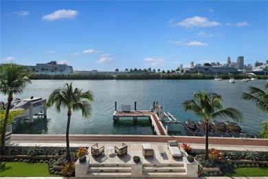 Experience luxury living in this exquisite 3-story waterfront