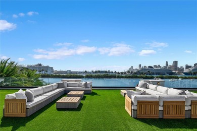 Experience luxury living in this exquisite 3-story waterfront