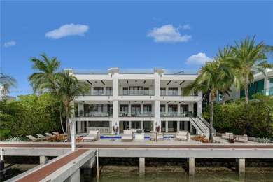 Experience luxury living in this exquisite 3-story waterfront
