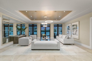 Experience luxury living in this exquisite 3-story waterfront