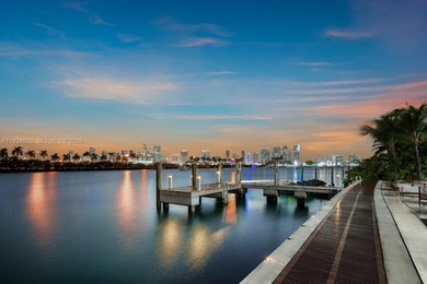 Experience luxury living in this exquisite 3-story waterfront