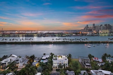 Experience luxury living in this exquisite 3-story waterfront