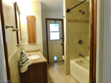 Imagine sitting by the pool of your 3-bedroom home, enjoying the - photo 11
