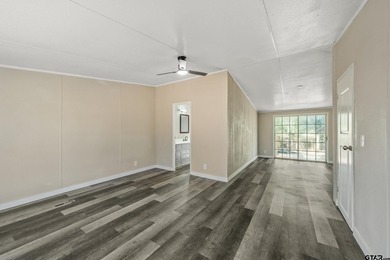 Welcome to this beautifully updated 4-bedroom, 2-bathroom mobile - photo 13