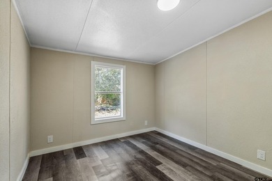 Welcome to this beautifully updated 4-bedroom, 2-bathroom mobile - photo 19