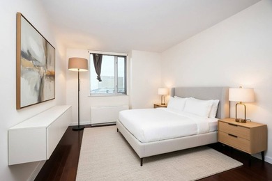 Perched high above the vibrant heart of Flushing, this elegant - photo 20