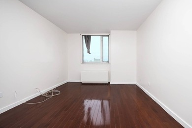 Perched high above the vibrant heart of Flushing, this elegant - photo 21