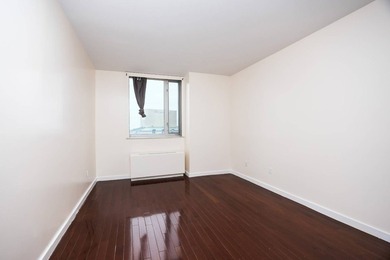 Perched high above the vibrant heart of Flushing, this elegant - photo 22