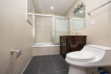 Perched high above the vibrant heart of Flushing, this elegant - photo 23