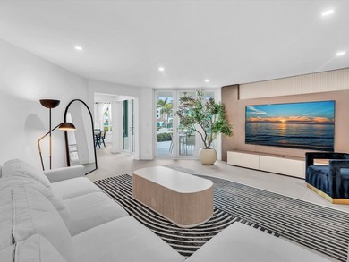 Welcome to luxury waterfront living in downtown Boca. This - photo 3