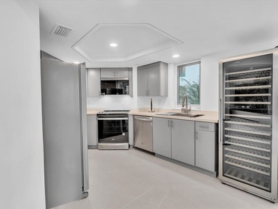 Welcome to luxury waterfront living in downtown Boca. This - photo 6