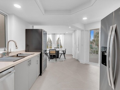 Welcome to luxury waterfront living in downtown Boca. This - photo 8