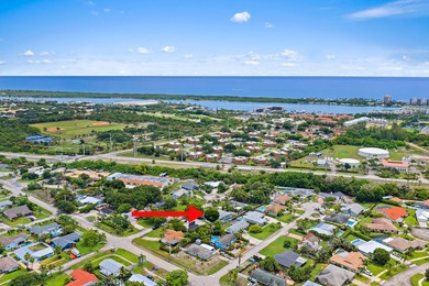 Welcome home to Tequesta Pines, one of Tequesta's most sought - photo 2