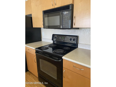 Charming 1-Bedroom Condo in a Prime Location This beautifully - photo 3