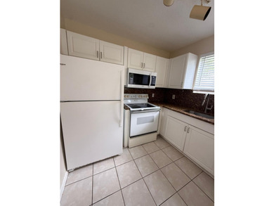 Welcome to this exceptional condominium located in the Cove at - photo 8
