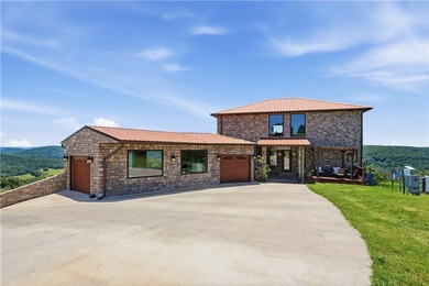 Perched on 7.22 acres within a secluded gated mountain setting - photo 4